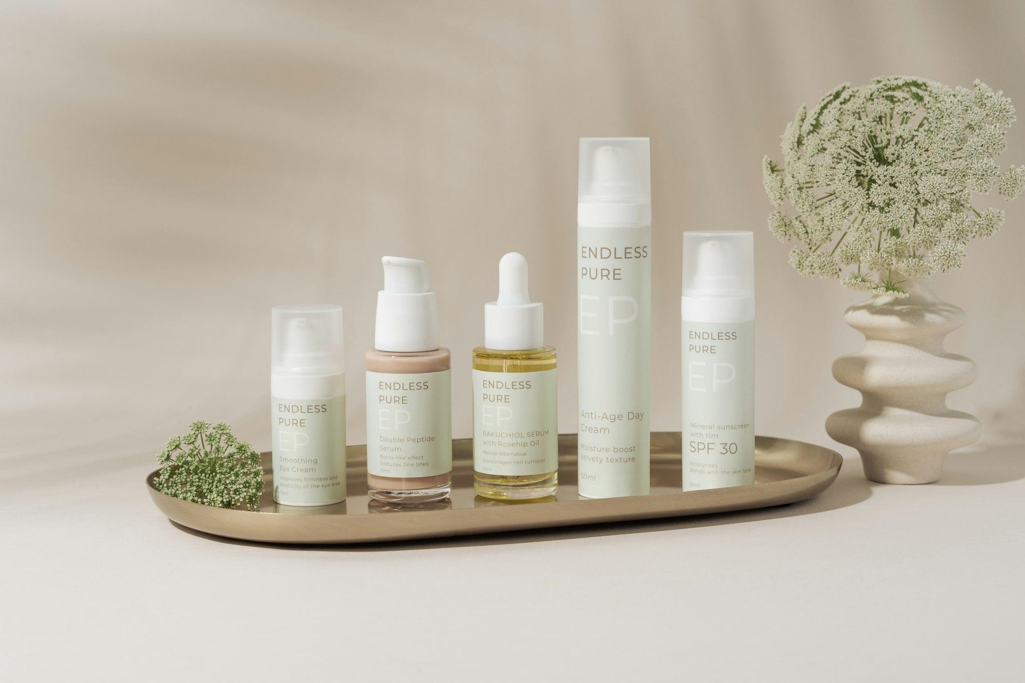 A line-up of skincare products on a tray